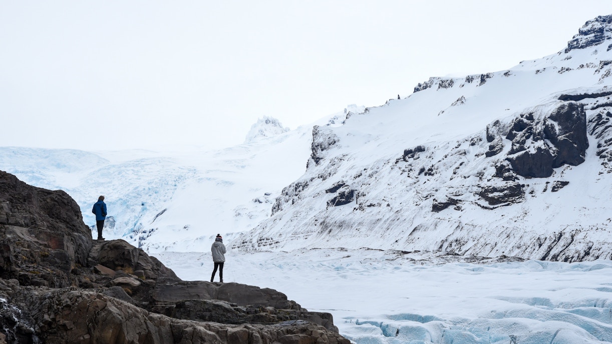 Tourists viewing Vatnajökull Glacier in Skaftafell National Park, Iceland.