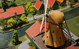 Windmill and traditional houses in Zaanse Schans, Netherlands.