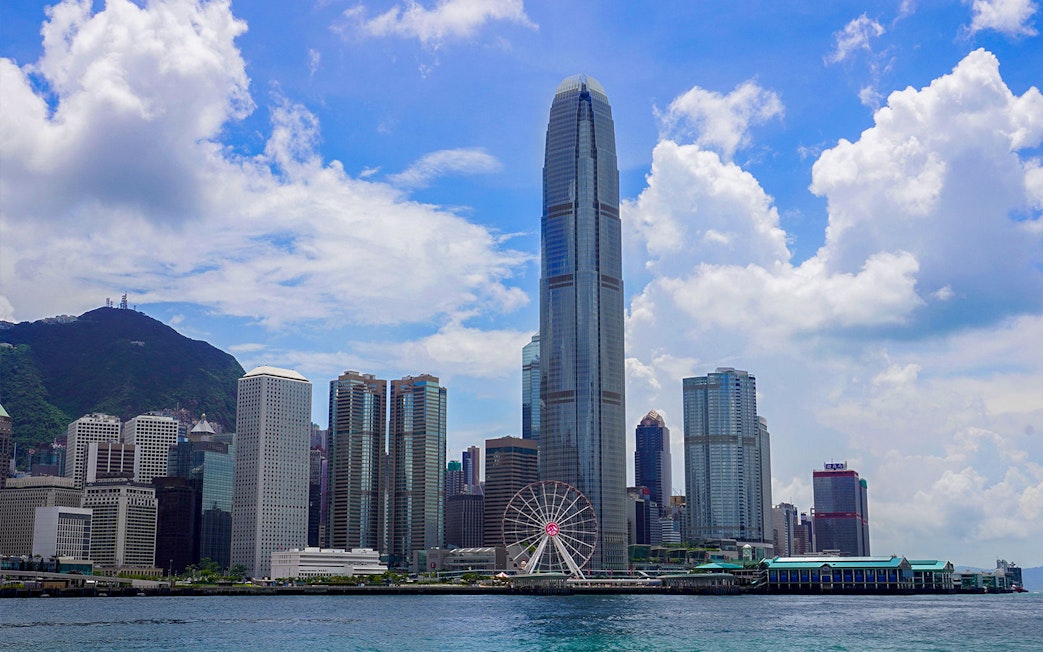 Hong Kong skyline with Observation Wheel and skyscrapers.