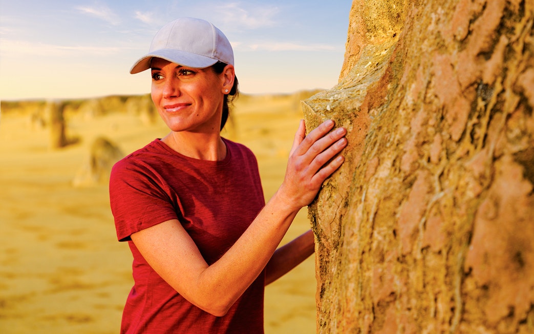 Tourist at Pinnacles Desert during sunset, Western Australia.