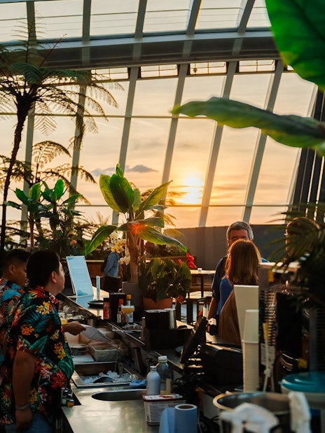 Guests enjoying sunset at Sky Garden bar during Music Night.