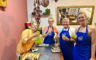 Participants enjoying a Brazilian cooking class in Copacabana, Rio de Janeiro.