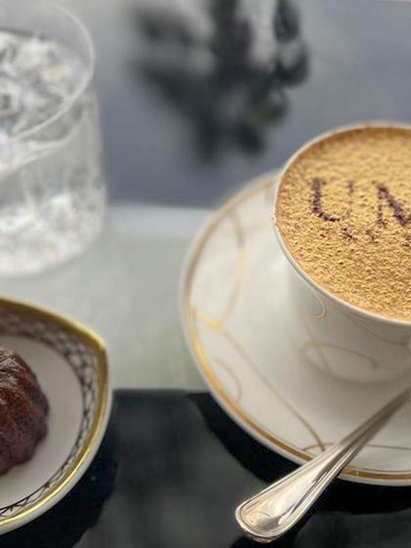 Gold cappuccino with "UMA" on top at UMA Lounge, Burj Al Arab, Dubai.