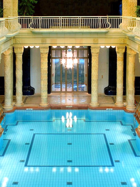 Indoor pool with ornate columns at Gellert Spa, Budapest.