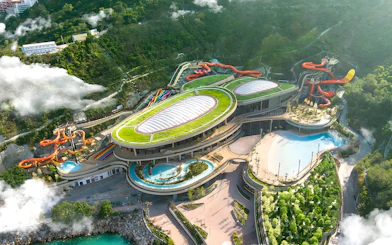 Aerial view of Water World Ocean Park Hong Kong with water slides and pools.