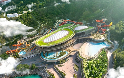 Aerial view of Water World Ocean Park Hong Kong with water slides and pools.
