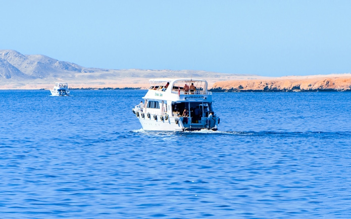 Cruise boat sailing at Ras Mohamed National Park, Egypt.