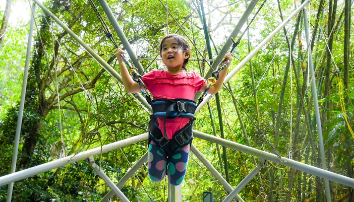child jumping on trampoline at ESCAPE Penang Jumping Jack, Malaysia.