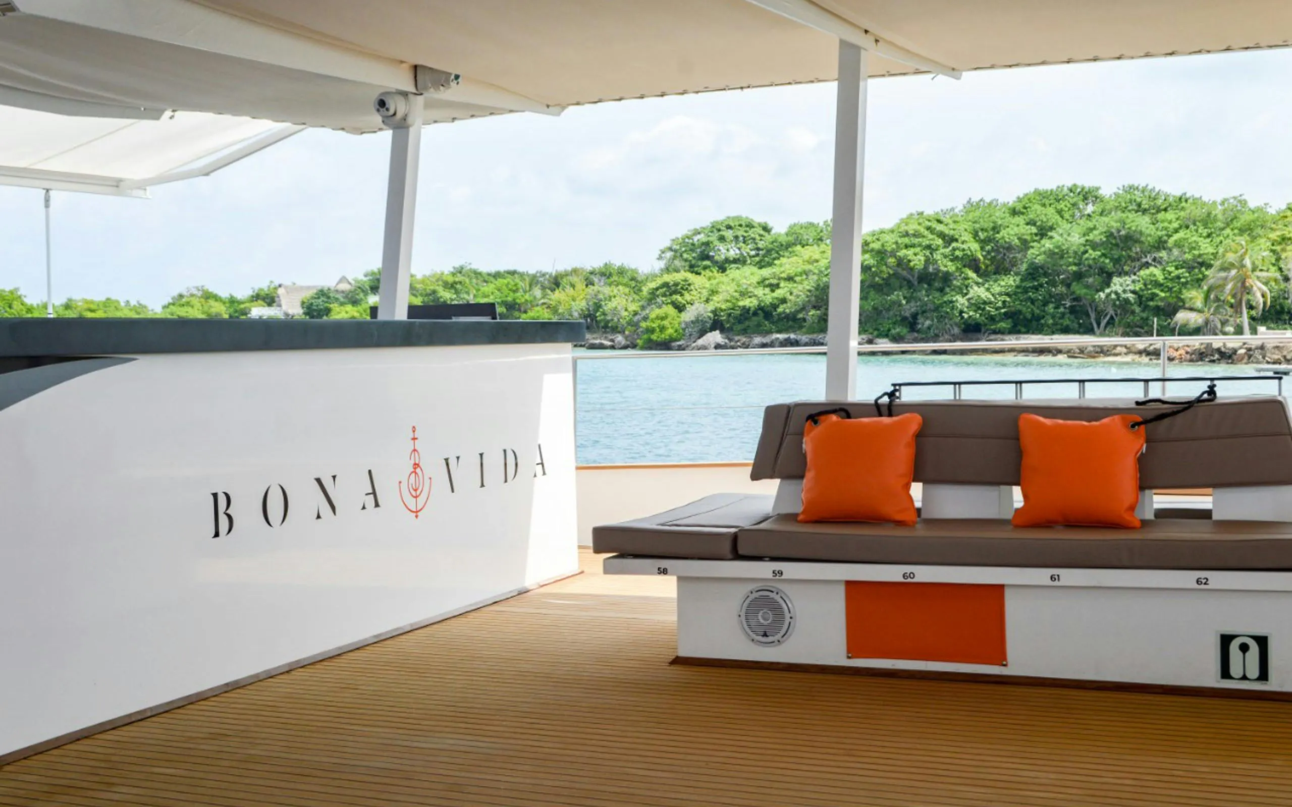 Catamaran deck with seating and bar on Cartagena Sunset Cruise.