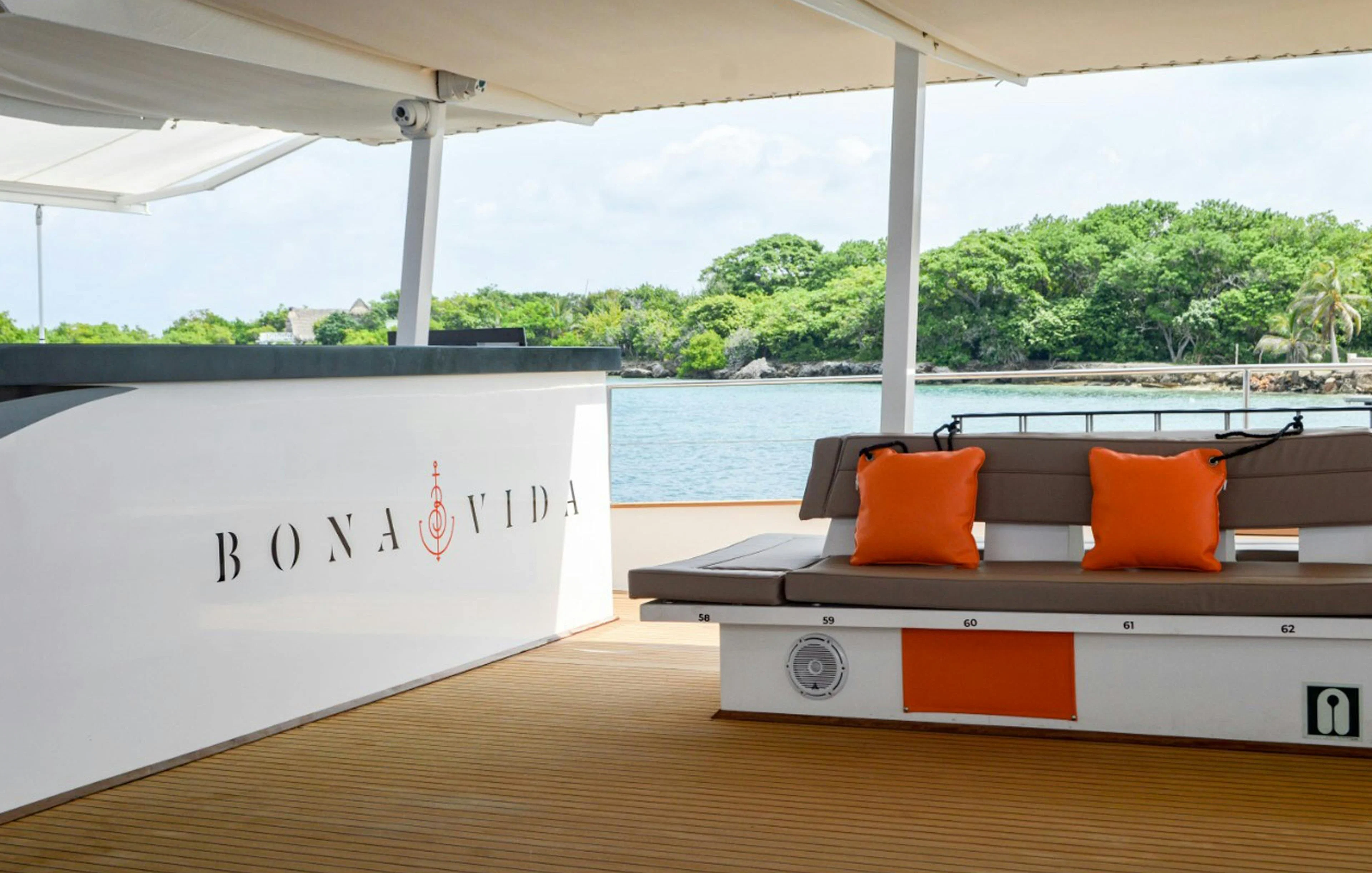 Catamaran deck with seating and bar on Cartagena Sunset Cruise.