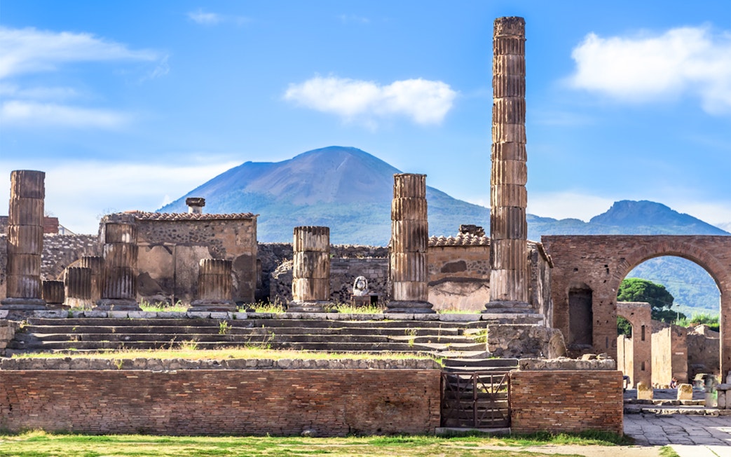 Ancient ruins of Pompeii with Mount Vesuvius in the background, UNESCO World Heritage Site.