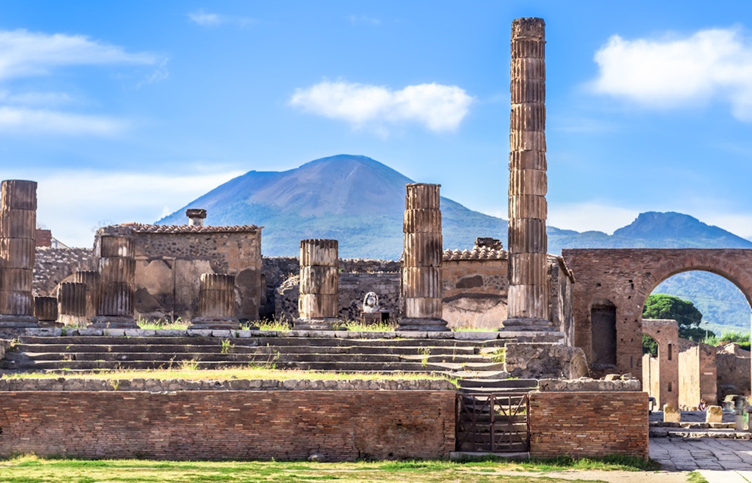 Ancient ruins of Pompeii with Mount Vesuvius in the background, UNESCO World Heritage Site.