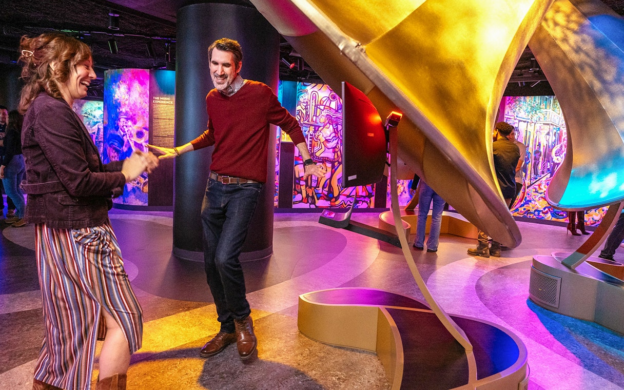 People enjoying music and dancing inside Vue Orleans Observation Deck.