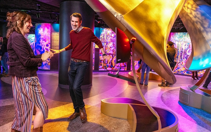 People enjoying music and dancing inside Vue Orleans Observation Deck.