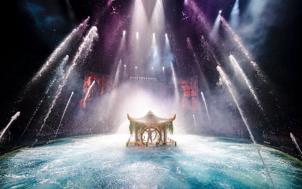 House of Dancing Water performance with water jets and illuminated stage.
