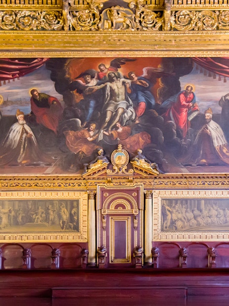 Interior artwork and ornate details of the Doge's Palace in Venice, Italy.