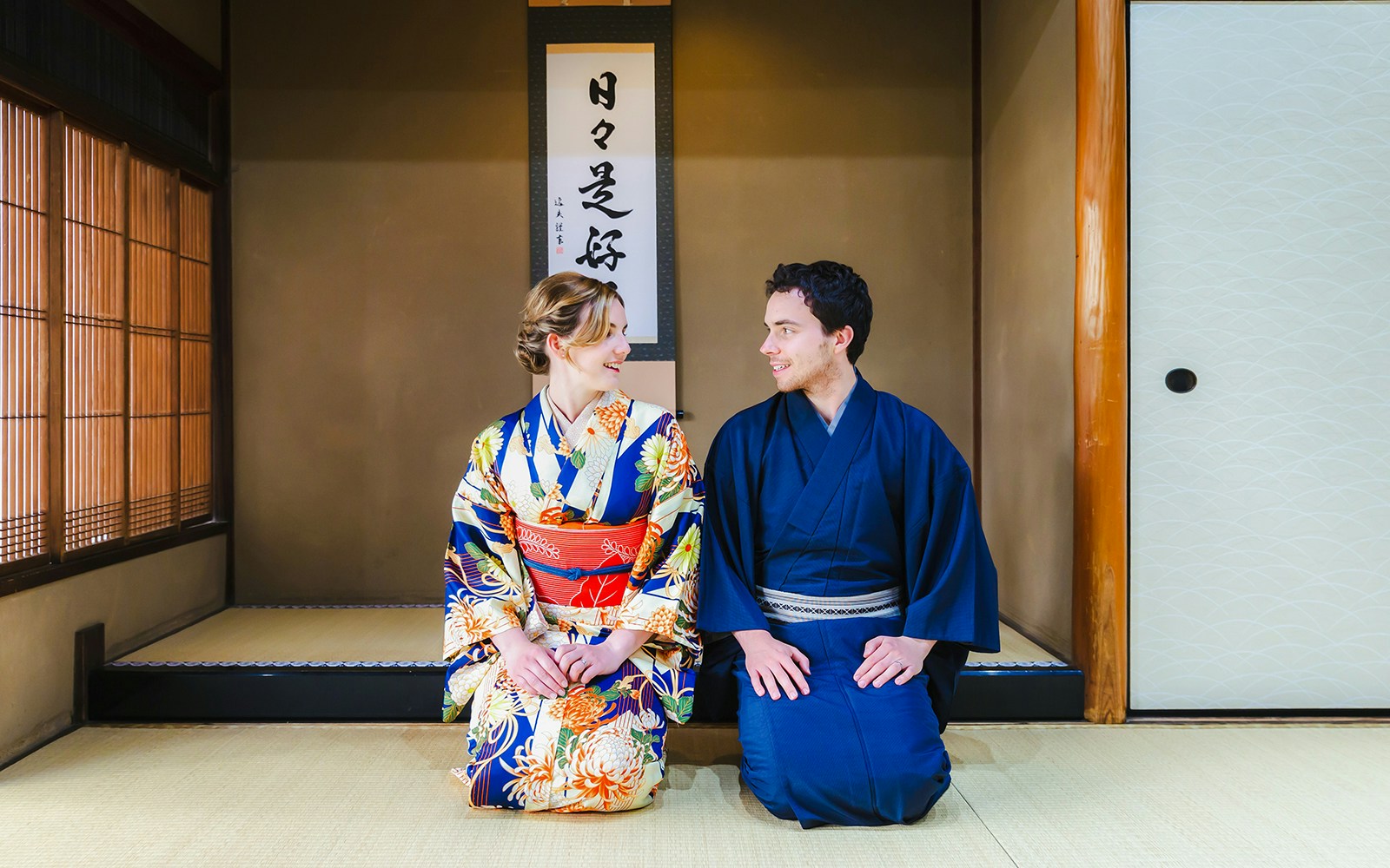 Couple in traditional kimonos at Kyoto Kimono Rental Yumeyakata.