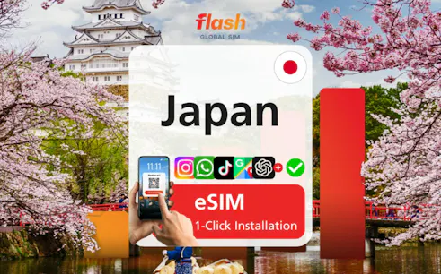 Japan eSIM installation with cherry blossoms and Osaka castle in background.