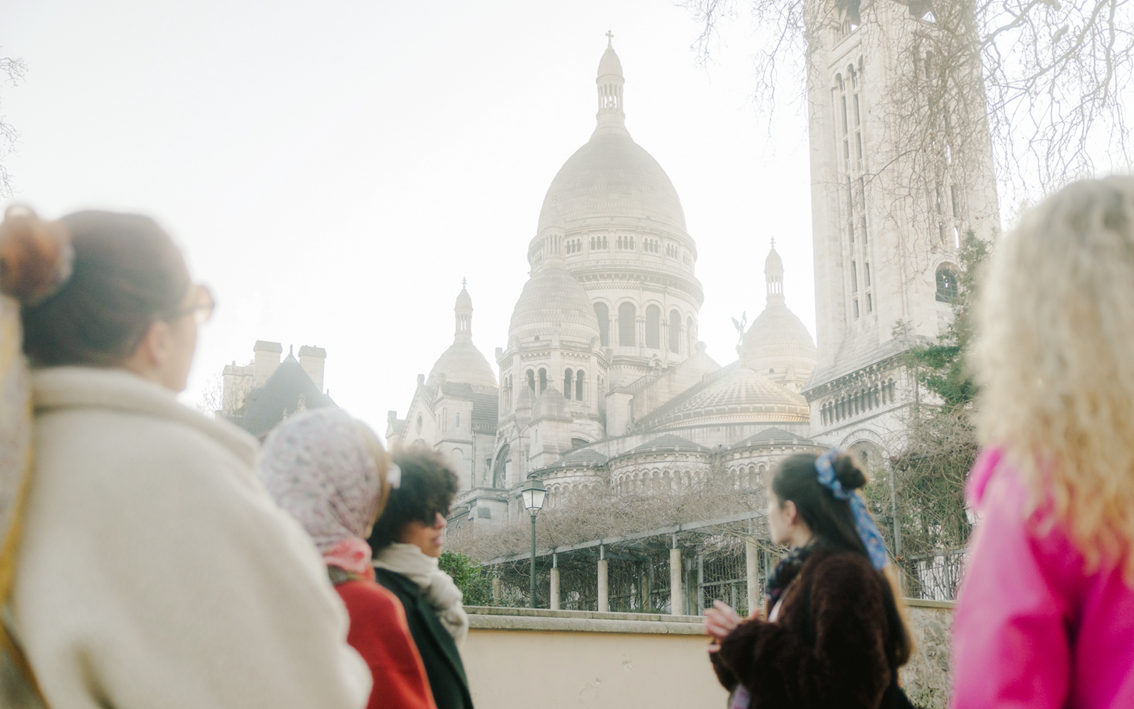 Tour group at Sacré-Cœur Basilica, Montmartre, Paris.