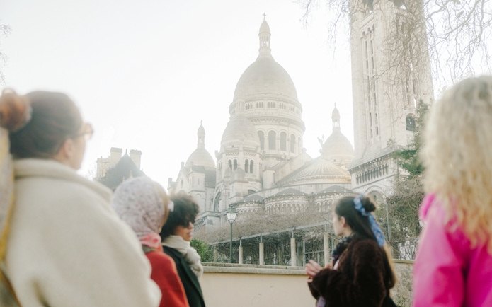 Tour group at Sacré-Cœur Basilica, Montmartre, Paris.