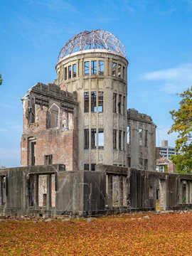 Hiroshima Peace Memorial, autumn leaves, blue sky, Japan.