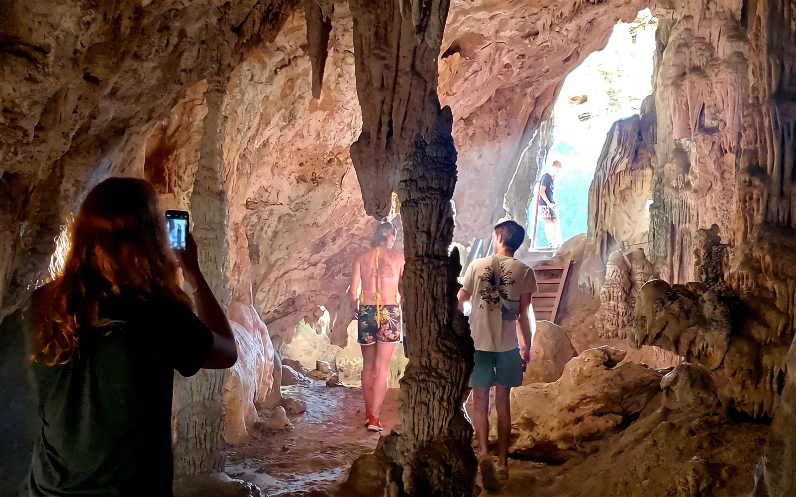 Visitors exploring Diamond Cave on Cheow Lan Lake tour, Krabi.