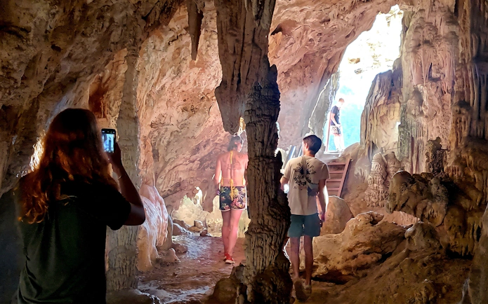 Visitors exploring Diamond Cave on Cheow Lan Lake tour, Krabi.