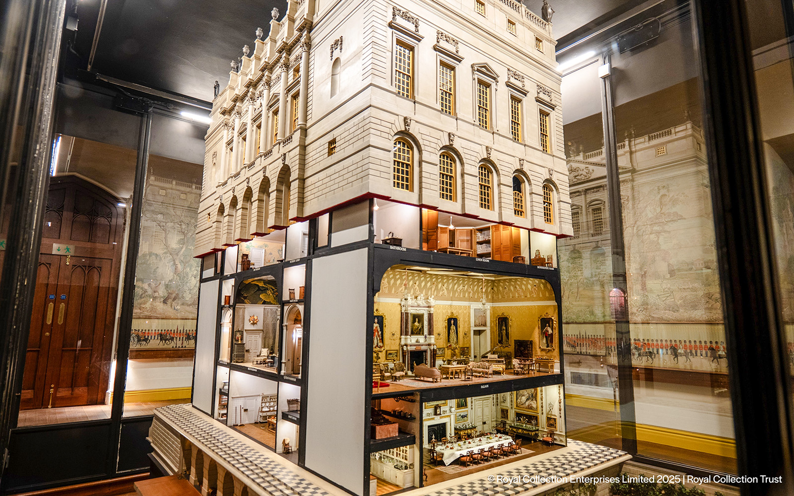 Queen Mary's Dolls' House interior at Windsor Castle, showcasing detailed miniature rooms.