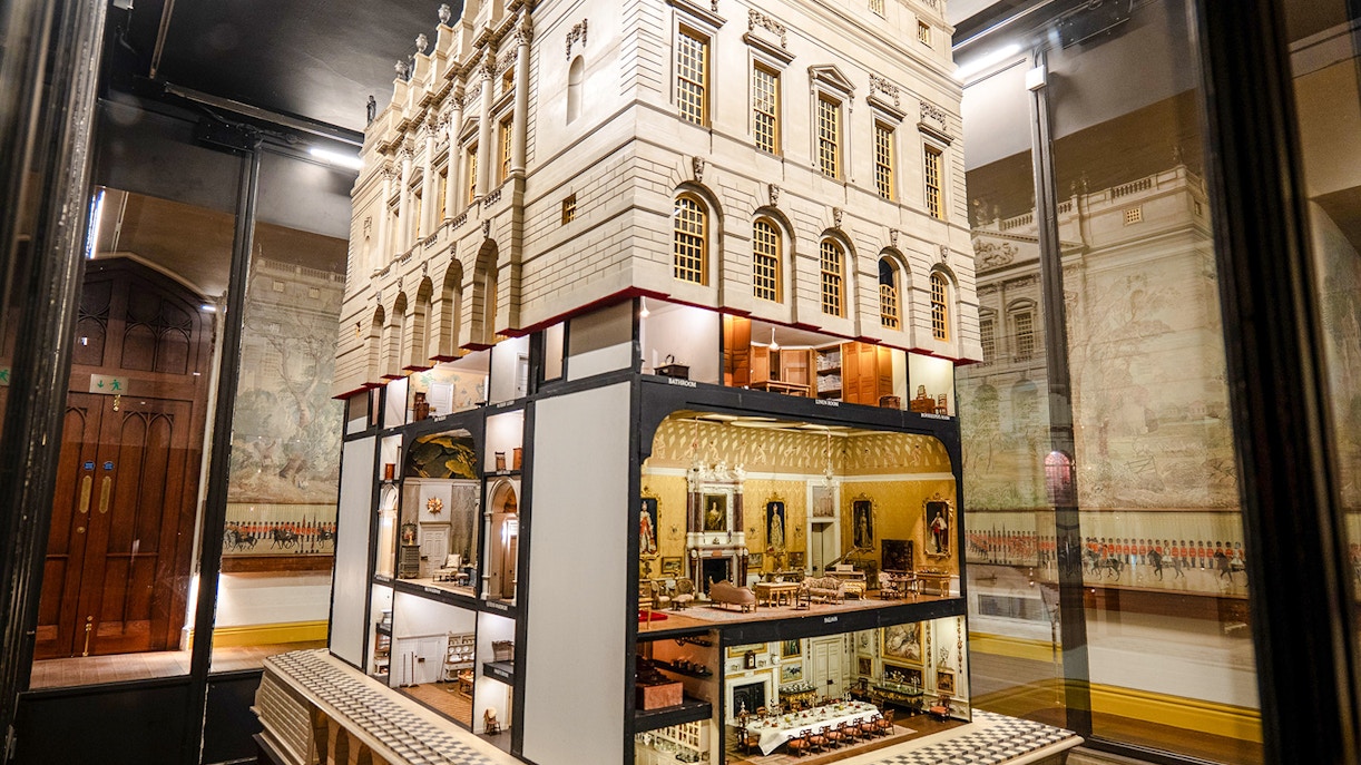 Queen Mary's Dolls' House interior at Windsor Castle, showcasing detailed miniature rooms.