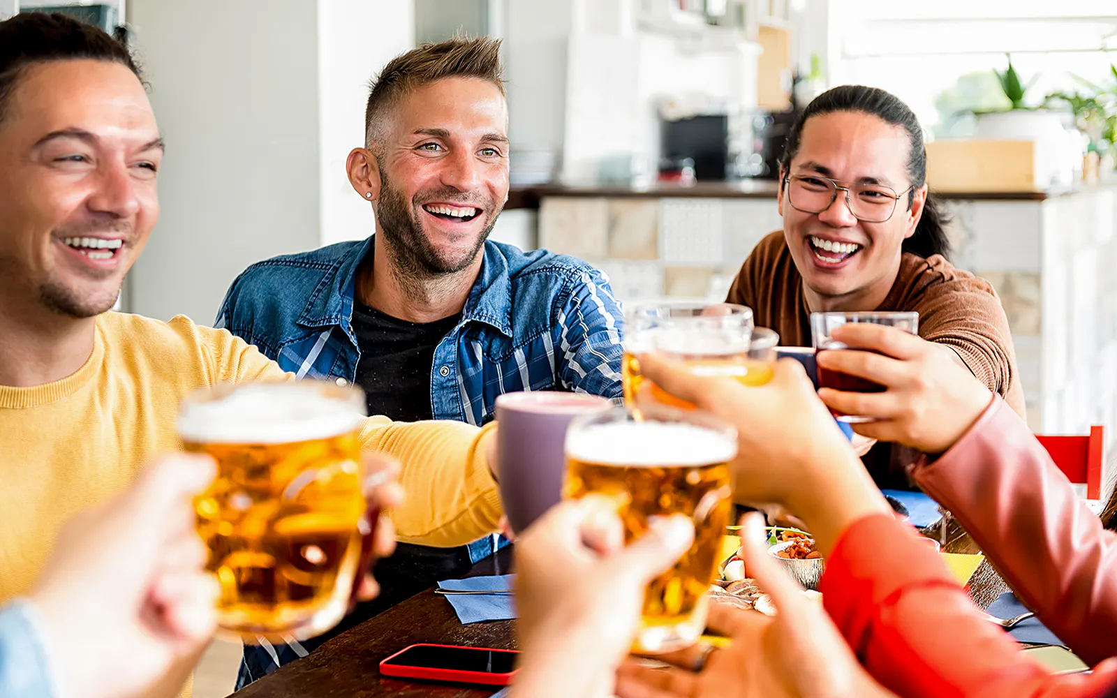 Group enjoying drinks in a Berlin café, part of the Berlin All-Inclusive Welcome Card experience.