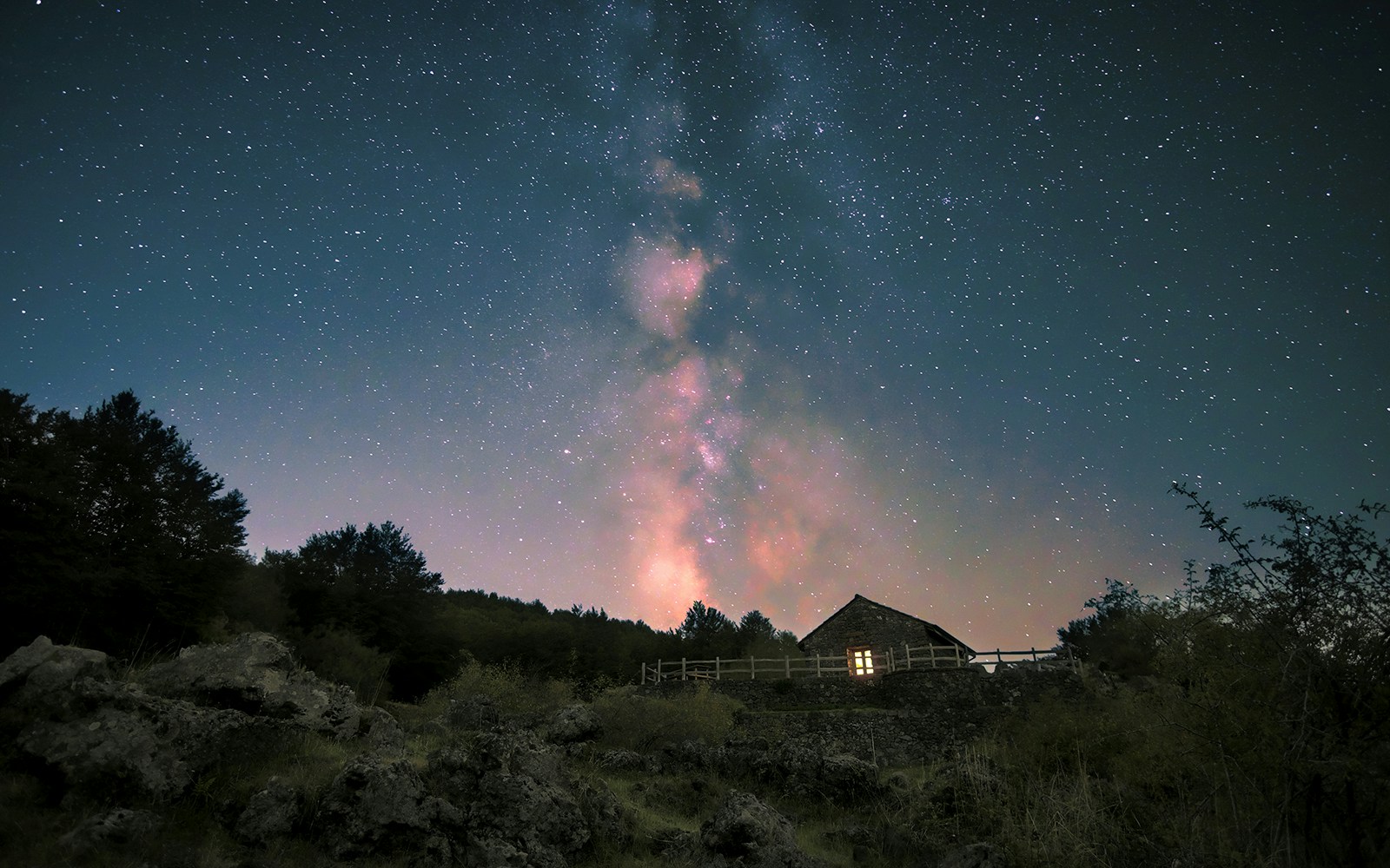 Mount Etna stargazing experience with clear night sky and volcanic landscape in Sicily, Italy.