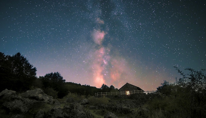 Mount Etna stargazing experience with clear night sky and volcanic landscape in Sicily, Italy.