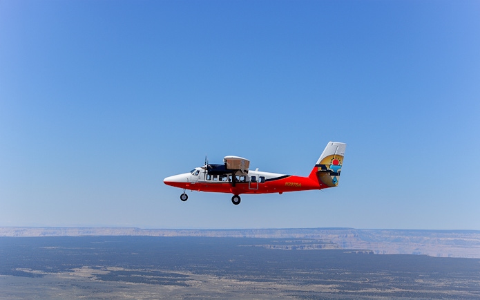 Helicopter flying over the Grand Canyon's North Rim.