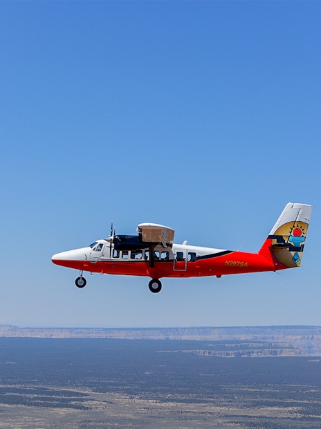 Helicopter flying over the Grand Canyon's North Rim.