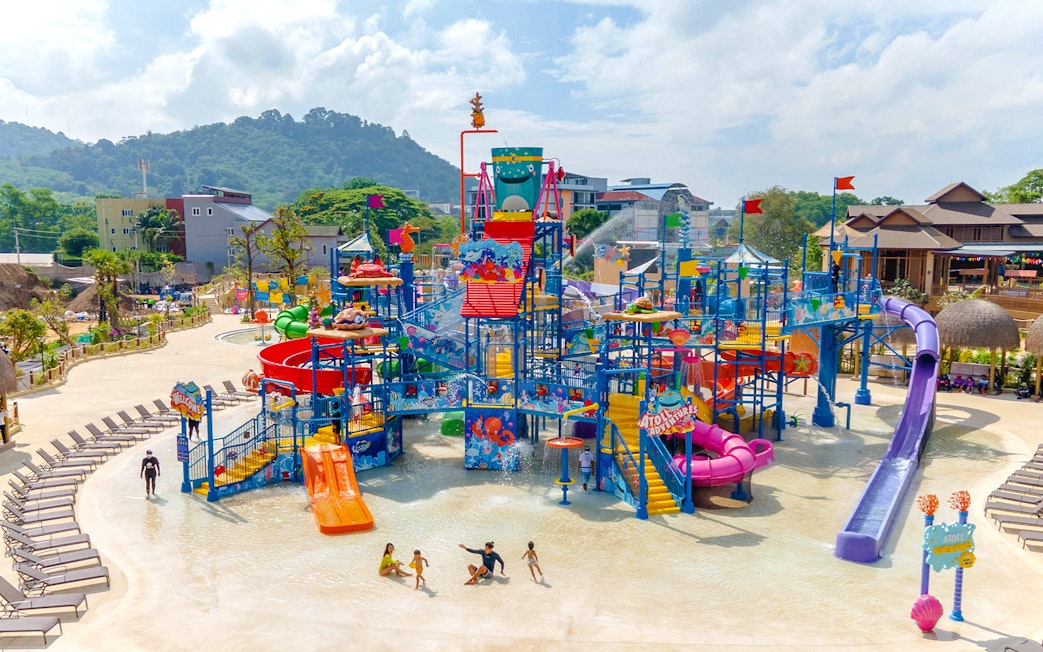 Aerial view of Andamanda Phuket water park with colorful slides and play areas.