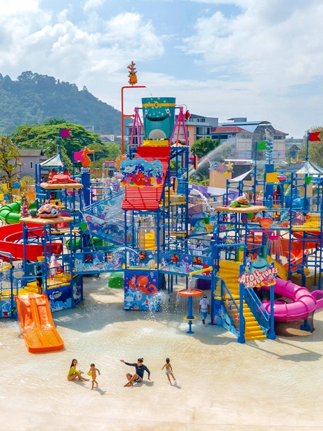 Aerial view of Andamanda Phuket water park with colorful slides and play areas.