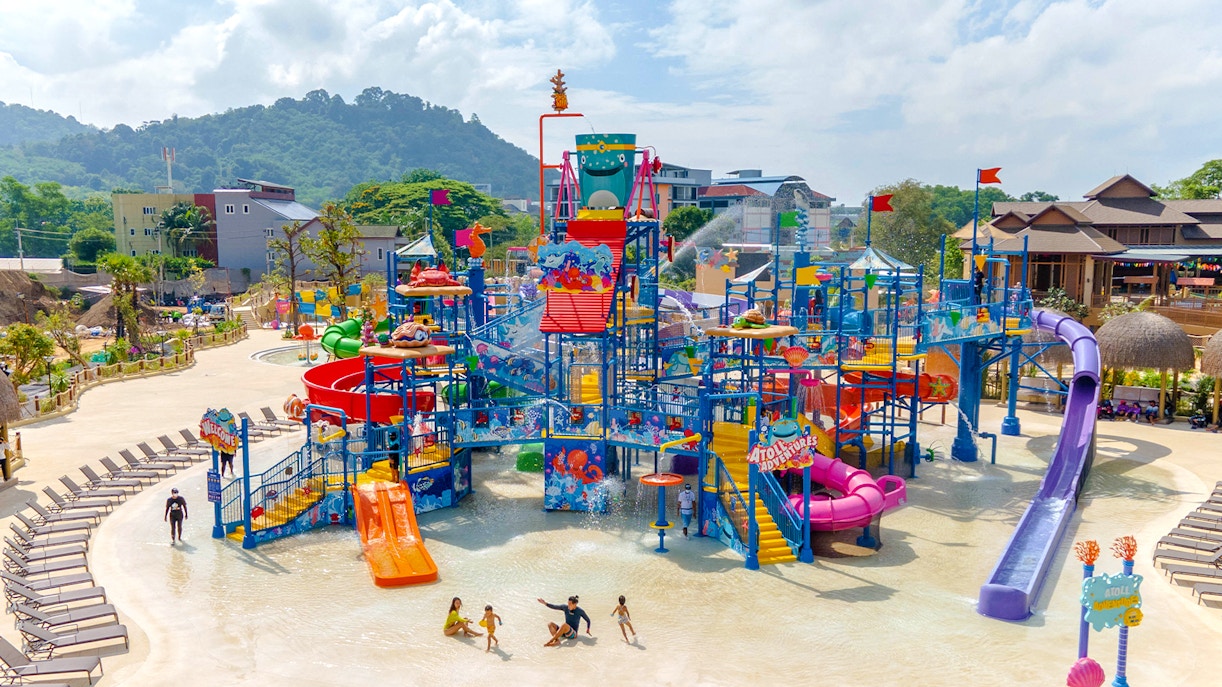 Aerial view of Andamanda Phuket water park with colorful slides and play areas.