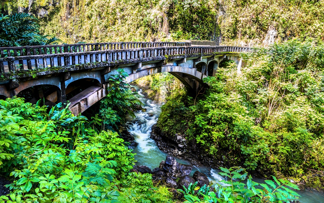 Bridge over Wailua Nui Stream at Upper Waikani Falls, Road to Hana, Maui, Hawaii.