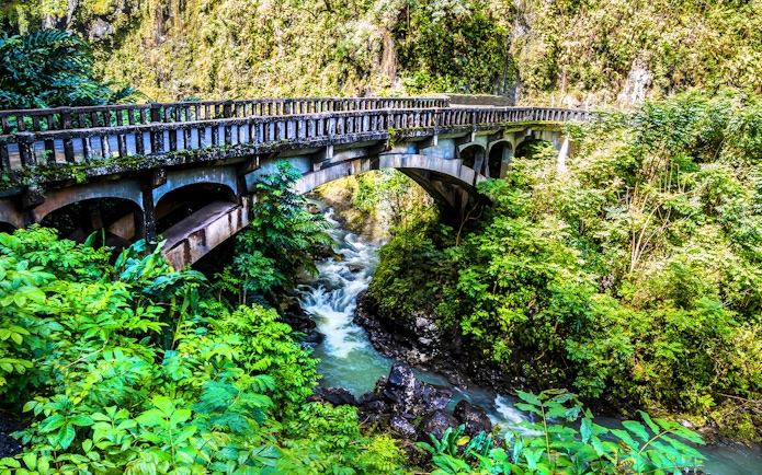 Bridge over Wailua Nui Stream at Upper Waikani Falls, Road to Hana, Maui, Hawaii.