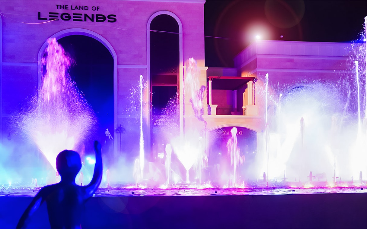 Chimera Fountain Show at Land of Legends, vibrant night water display.