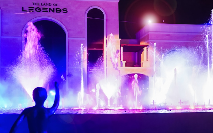 Chimera Fountain Show at Land of Legends, vibrant night water display.