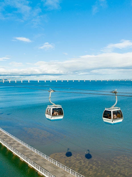 Cable cars over Tagus River in Lisbon during the Telecabine Lisbon Experience.