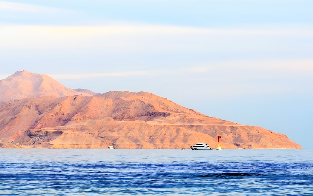 Tiran Island landscape with boats on the Red Sea, Sharm El Sheikh.