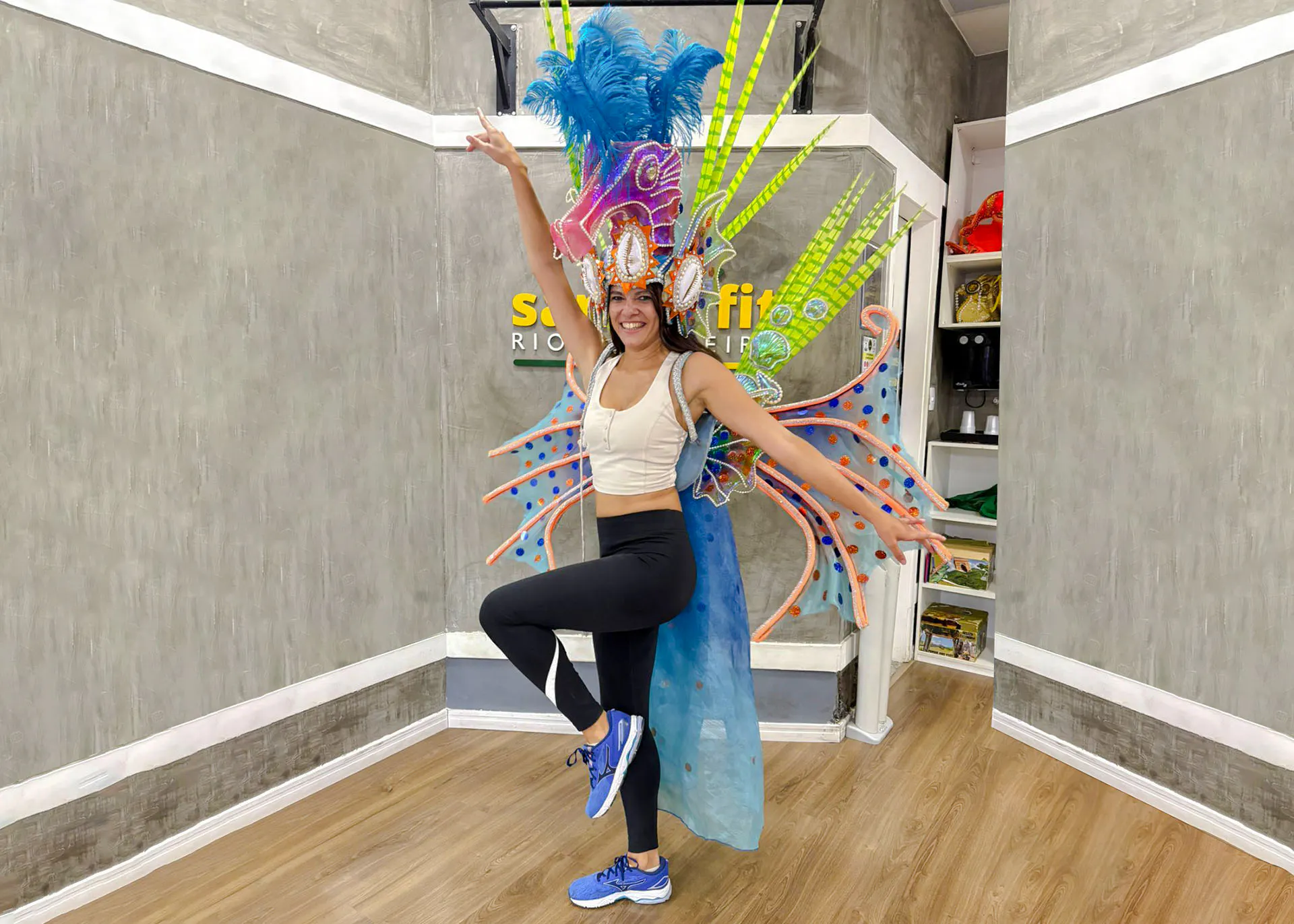 Dancer in colorful costume at Samba class, Ginga Tropical, Rio de Janeiro.