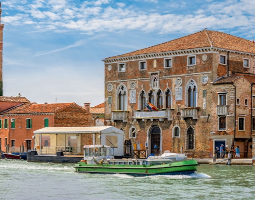 Palazzo da Mula and San Pietro Martire bell tower in Murano, Venice, Italy.