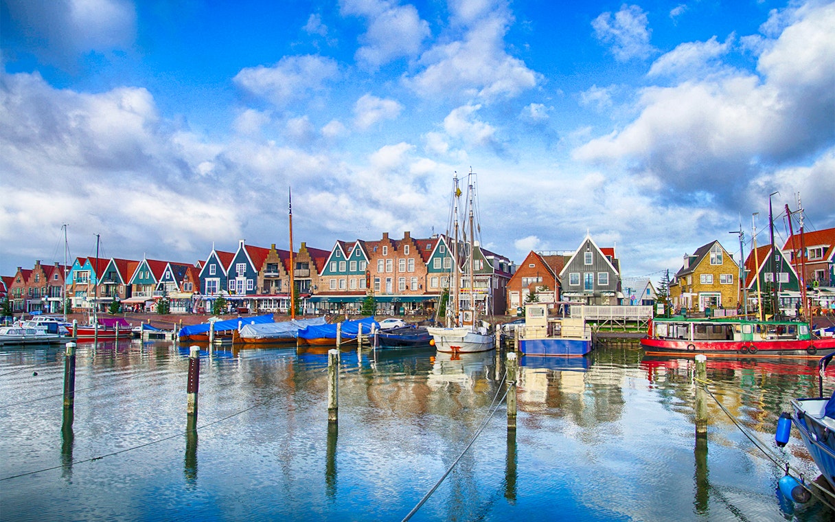 Marina and colorful waterfront houses in Volendam, Netherlands.