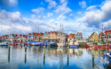 Marina and colorful waterfront houses in Volendam, Netherlands.