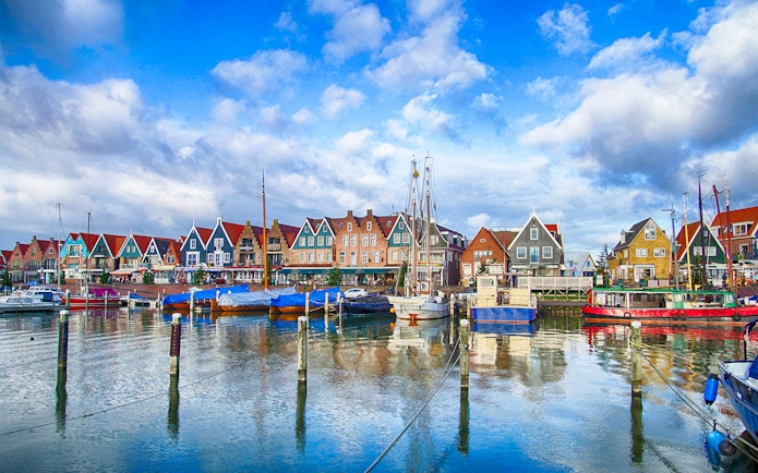Marina and colorful waterfront houses in Volendam, Netherlands.