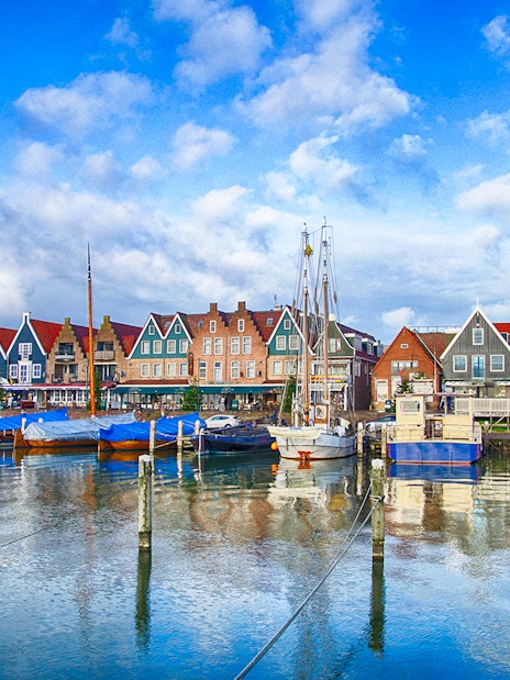 Marina and colorful waterfront houses in Volendam, Netherlands.