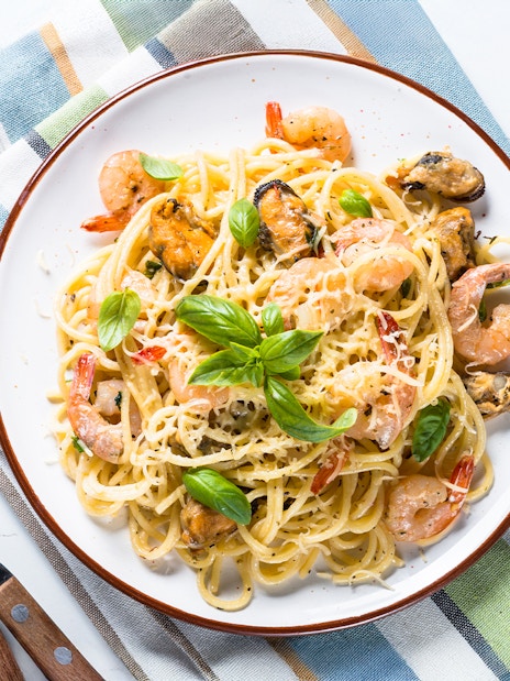 Seafood pasta with cream sauce served on Steamboat Natchez Evening Dinner Cruise.